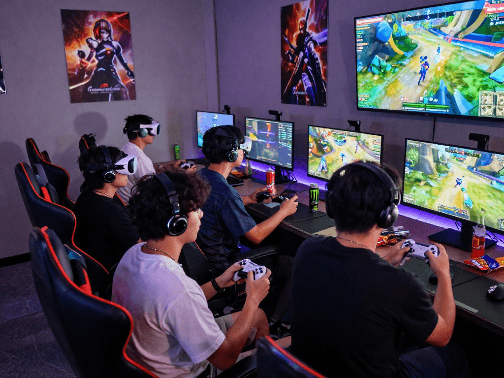 Engaged gamers using rokok88 link login for an immersive gaming experience in a vibrant setting.